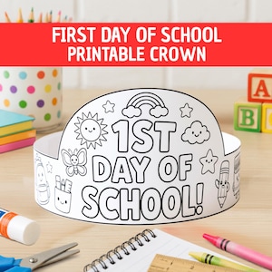May include: A white paper crown featuring black line art for coloring, with the text 1ST DAY OF SCHOOL. The design includes illustrations of a sun, a rainbow, a butterfly, a cloud, a star, a pencil, and a backpack with a smiling face.