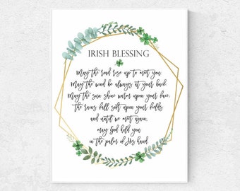 May include: Printable sign with an Irish blessing in a gold and green leafy frame. The text reads: "May the road rise up to meet you. May the wind be always at your back. May the sun shine warm upon your face. The rain fall soft upon your fields and until we meet again, may God hold you in the palm of His hand."