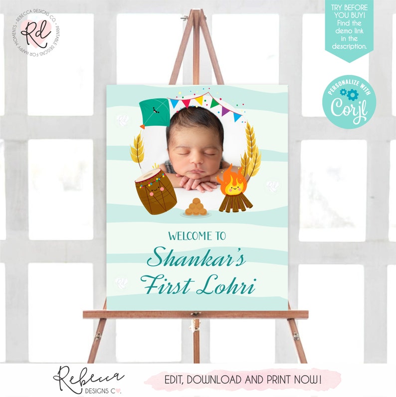 May include: A blue and white striped welcome sign for a baby's first Lohri celebration. The sign features a photo of a baby, a bonfire, a drum, and a kite. The text on the sign reads "Welcome to Shankar's First Lohri".