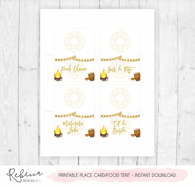 May include: Printable place card/food tent with four sections. Each section has a gold banner, text, a bonfire illustration, and a drum illustration. The text includes "Pindi Channe", "Gur le Rote", "Murmura Ladoo", and "Til le Barfee".