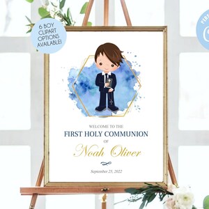 May include: A printable sign for a First Holy Communion celebration. The sign features a watercolour background with a gold geometric frame. A cartoon boy in a suit and holding a bible is in the centre of the sign. The text on the sign reads "Welcome to the First Holy Communion of Noah Oliver September 25, 2022".