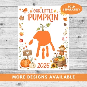 May include: A white rectangular print featuring the orange text OUR LITTLE PUMPKIN and 2026. The centre displays an orange handprint with a green stem. Illustrations include a bird, leaves, a wooden sign with a heart, pumpkins, a scarecrow, and a sunflower.
