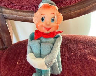 Mid century knee hugger elf ornament or shelf sitter.