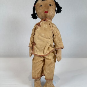Vintage Chinese Doll Sawdust Filled Painted Face Silk Clothes