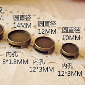 May include: Five different sizes of round metal trays with a hole in the center. The trays are 16mm, 14mm, 12mm, 10mm, and 18mm by 13mm. The text "圆直径" is written in Chinese characters above each tray, followed by the diameter in millimeters. The text "内孔" is written in Chinese characters below each tray, followed by the hole size in millimeters.