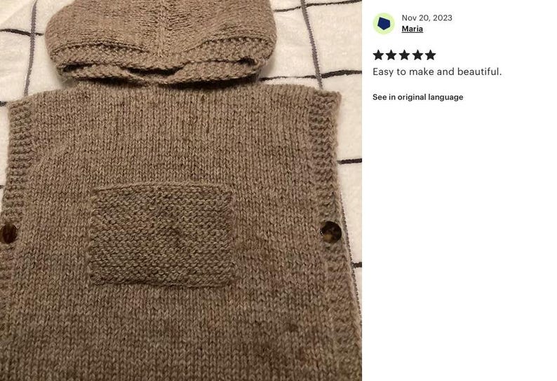 May include: A knitted, hooded vest in a neutral brown color. The vest features a front pocket and is fastened with two large, round buttons. The hood is attached to the vest. The text "Easy to make and beautiful" is visible.