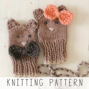 knitted baby mittens with bow and round ears, decorated with bow and embroidery nose and eyes, knitting pattern to make these thumbless baby mitts