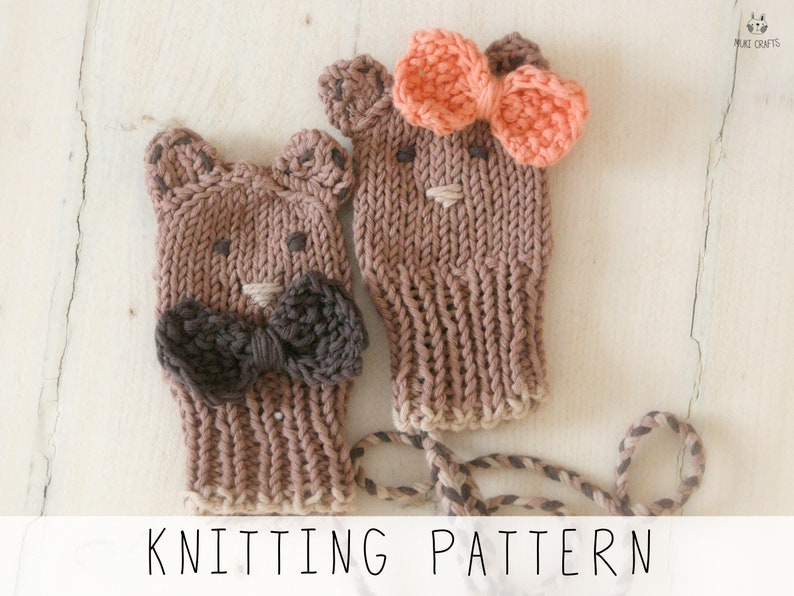 knitted baby mittens with bow and round ears, decorated with bow and embroidery nose and eyes, knitting pattern to make these thumbless baby mitts