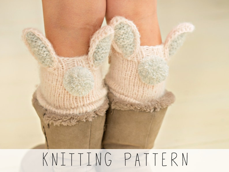 Light pink knitted leg warmers with pom pom tail and bunny ears, knitting pattern to make these leg warmers