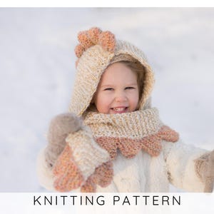 May include: A child wearing a knitted hat, scarf, and mittens set. The set is beige with peach-coloured accents. The hat has a hood and a decorative top. The mittens and scarf have a scalloped edge. The text "KNITTING PATTERN" is at the bottom.