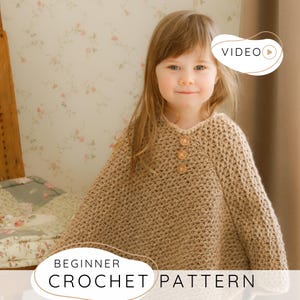 May include: A tan crochet poncho with three wooden buttons. The poncho is worn by a young girl. The image includes the text "BEGINNER CROCHET PATTERN" and a "VIDEO" icon.