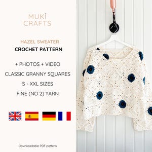 May include: Cream-colored crochet sweater with dark blue floral accents, hanging on a white hanger. The sweater is made of granny squares. The text on the image says "HAZEL SWEATER CROCHET PATTERN".