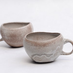 Mug Earthling - "Shell" - organic natural shape stoneware in beige, minimalist monochrome handmade wheel thrown pottery