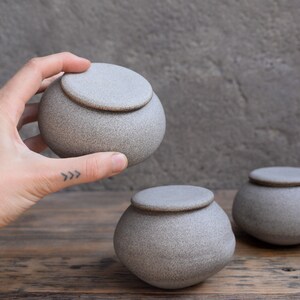 STC pebble stone lidded jar container, minimalist monochrome handcrafted handmade wheel thrown pottery