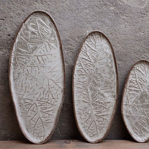 Abstract leaf platter, Organic natural shape elongated stoneware plate in grey cream, minimalist monochrome handcrafted handmade pottery