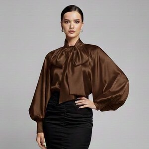 Brown formal satin blouse wit bow and puffy sleeves