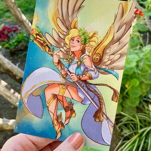May include: A digital illustration of a woman with golden wings and a white dress holding a staff. She has a laurel wreath on her head and a golden halo. The background is a blue and yellow sky.