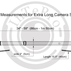 May include: A white camera strap with purple accents. The strap is 15.5 inches long and 2 inches wide. The strap can be adjusted to lengths between 34 and 59 inches.