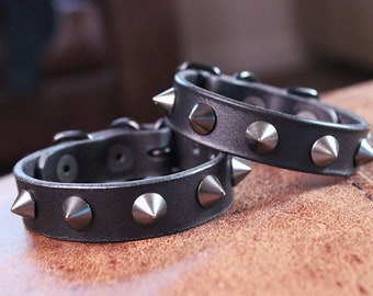 Slim spiked bracelets with black hardware, studded bracelets gunmetal