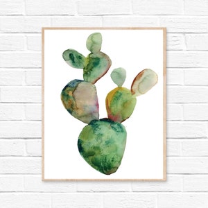 May include: Watercolor painting of a green cactus with multiple arms. The cactus is painted in shades of green, yellow, and brown.