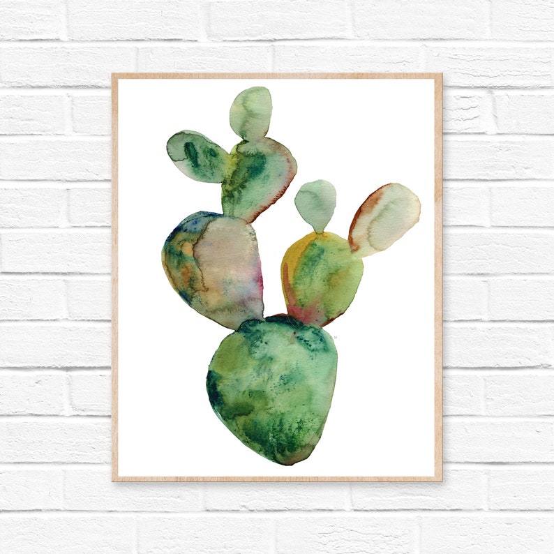 May include: Watercolor painting of a green cactus with multiple arms. The cactus is painted in shades of green, yellow, and brown.