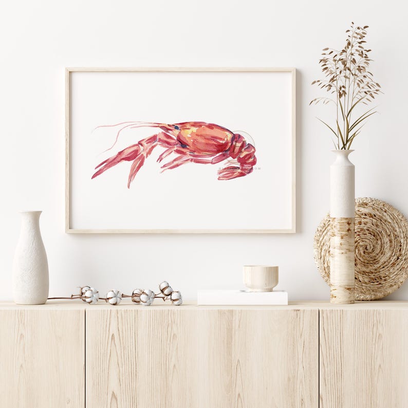 May include: Watercolor painting of a red crawfish on a white background. The crawfish is depicted in a realistic style with detailed features.