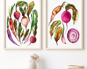 May include: Two framed watercolor paintings of vegetables. The first painting features a purple carrot, a red beet, a white turnip, and green leafy vegetables. The second painting features a red beet, a purple onion, a carrot, and green leafy vegetables.