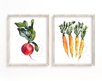 May include: Two watercolor paintings in white frames. The left painting features a red beet with green leaves. The right painting features four orange carrots with green tops.