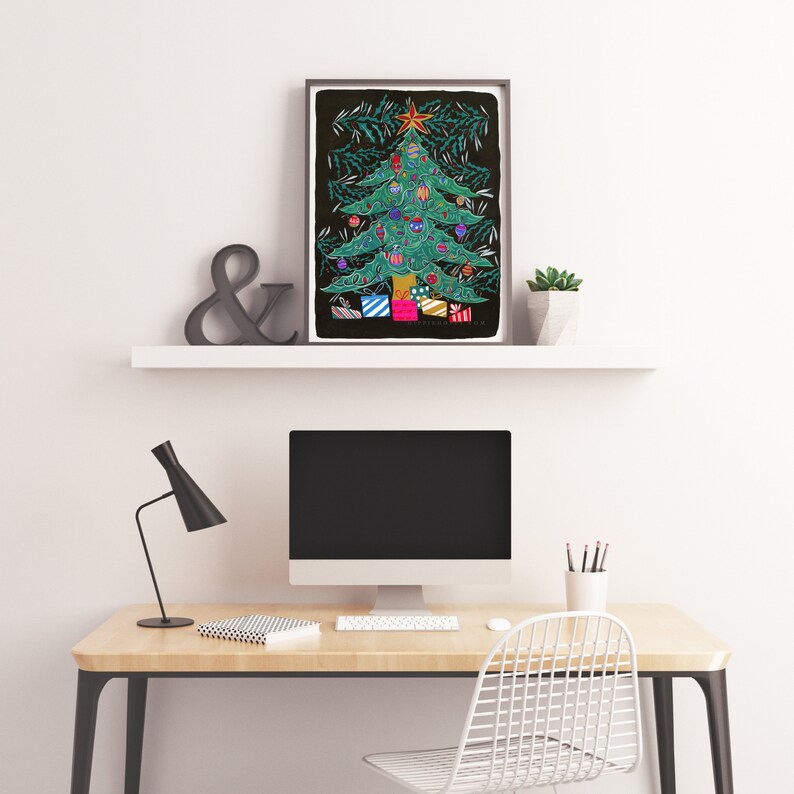 May include: A framed illustration of a green Christmas tree with colorful ornaments and presents. The tree is decorated with a star on top and surrounded by pine branches. The background is black.
