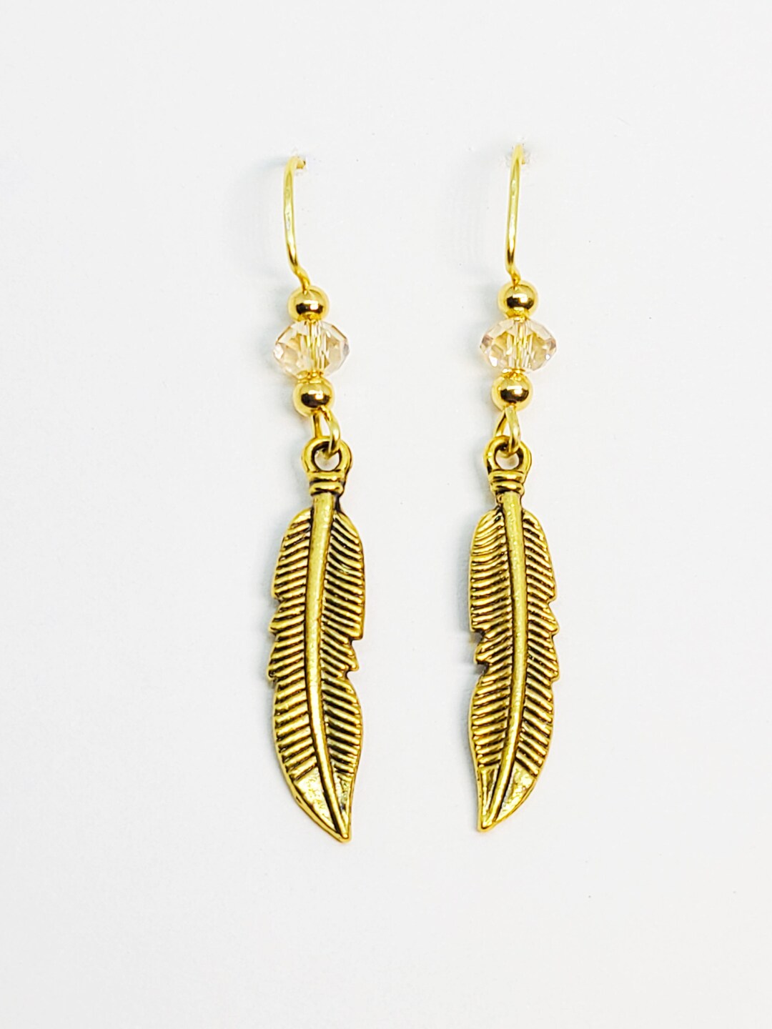swarovski feather earrings
