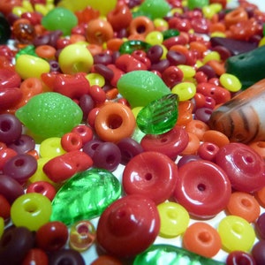 Vintage bead mix, Czech pressed glass, Bohemian African trade, Dun duns or Mali Wedding beads, other pieces red, yellow &green. 8.5 oz