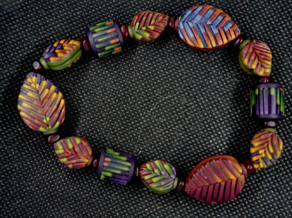 Laura Liska's famous lovely polymer leaf beads in… - image 2