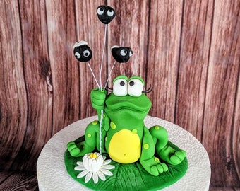 Fondant frog cake topper with fly balloons