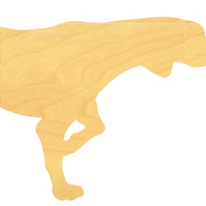 May include: A wooden cutout of a dog in a running pose. The dog is light brown and has a smooth, unpainted surface. The cutout is a silhouette, showing the dog's profile with its tail raised.
