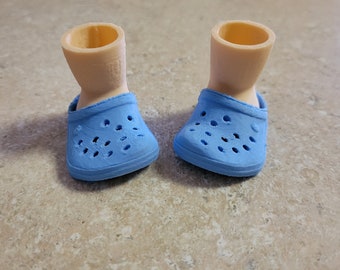 Pies de gnomo con cocodrilos