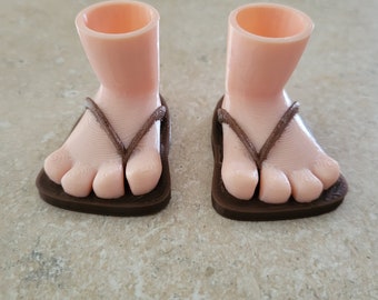 Chanclas de gnomo de color marrón con pie