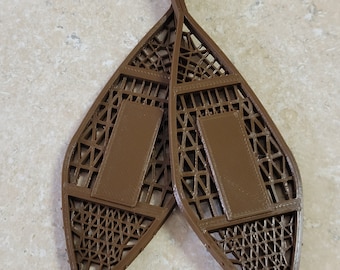 Raquetas de nieve de color marrón de Gnome