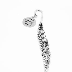 May include: Silver feather bookmark with a round charm that reads "God is within her she will not fall".