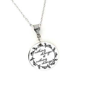 Halsband med "Ingenting förändras om ingenting förändras", present till att börja om, present till återhämtning, present till skilsmässa, present till flytt, present till henne, present till fru, present till dotter