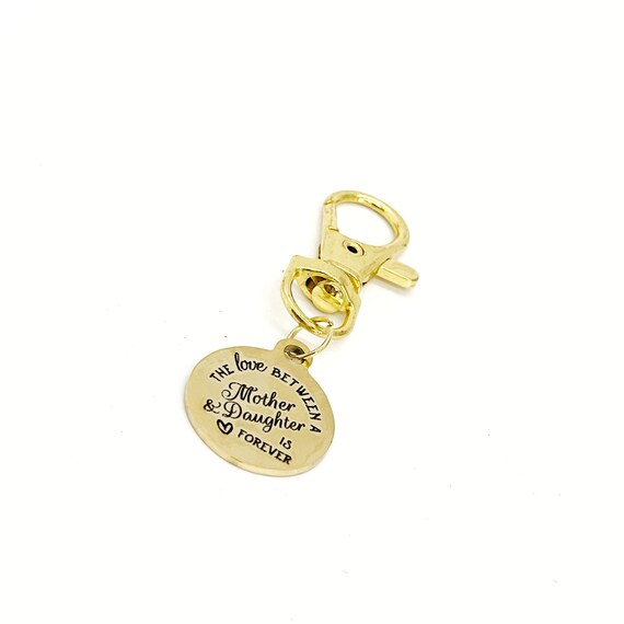 Mom and Daughter Gifts, The Love between A Mother And Daughter Is Forever Clip On Charm, Keychain Charm, Purse Charm, Bag Charm