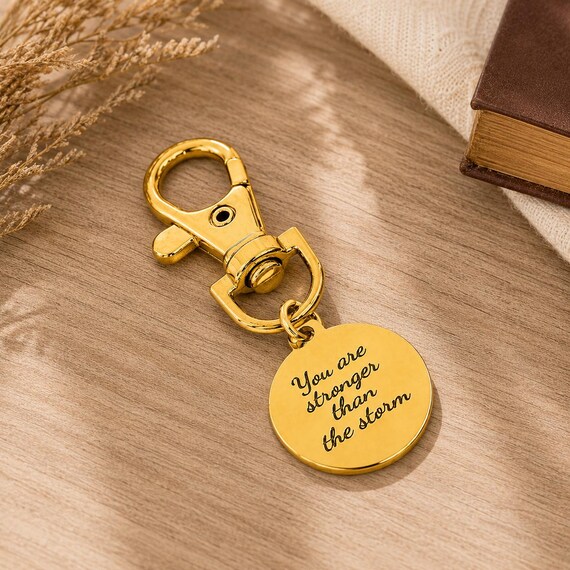 You Are Stronger Than The Storm Goldtone Charm