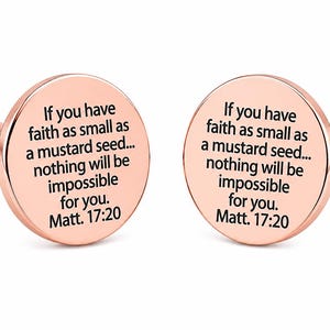 May include: Rose gold cufflinks with the text "If you have faith as small as a mustard seed... nothing will be impossible for you. Matt. 17:20" in black. The cufflinks are round with a T-bar closure.