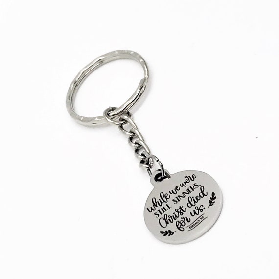 Faith Keychain, While We Were Still Sinners Christ Died For Us Keychain, Romans 5 8, Faith Gift, Charm Keychain, Christian Keychain Gift