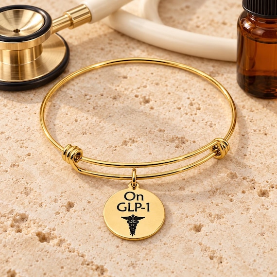 On GLP-1 Goldtone Notice Charm Bracelet