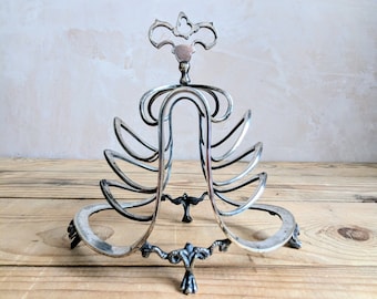 An unusual  Victorian Aesthetic Movement silver plated toast rack C1860