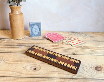 A vintage Cribbage board  C1950 - inlaid with various specimen wood inlays Harrods.