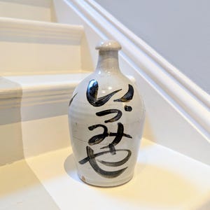 An antique Japanese grey stoneware Sake Bottle C1930