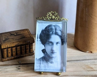 An antique C19th French gilt brass or ormolu frame C1890