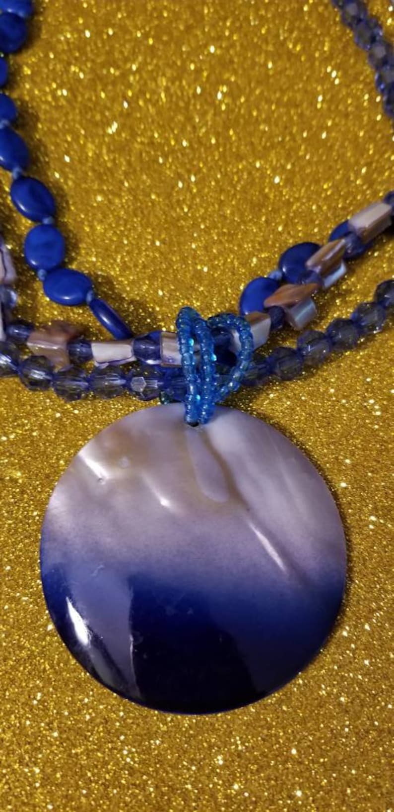shell beads Multistrand mother of pearl One of my earlier pieces of jewelry. Adjustable from 18 to 20 inches and plastic beads necklace