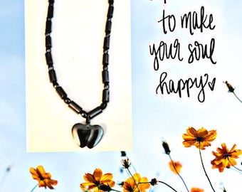 Beautiful hematite double heart pendant necklace 18 inches long and weighing 1150 carats.